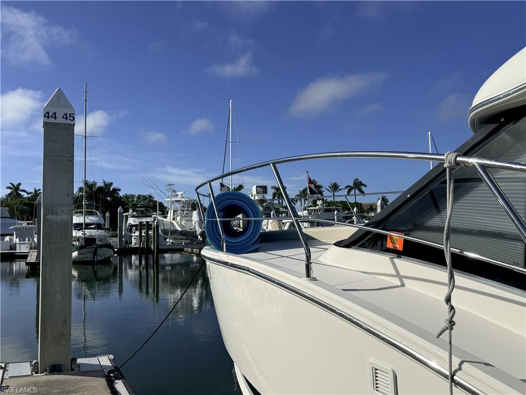 Exceptional opportunity to own a 45-foot boat slip at the prestigious Marco Island Marina, offering deep-water, direct Gulf access with no bridges. This floating dock slip provides quick access to the Gulf of America, the Ten Thousand Islands, world-class fishing, and Southwest Florida's premier boating destinations.

Located within Marco Island's 365-day liveaboard marina, owners enjoy a full-service marina lifestyle with outstanding amenities, including 50-amp shore power, water, cable, Wi-Fi, a swimming pool, fitness center, private showers, restrooms, laundry facilities, and a full-time Dockmaster. Rental management services are available, providing excellent flexibility and investment potential for owners.

Conveniently located just steps from parking and adjacent to the Marco Island Yacht Club, where membership opportunities may be available (subject to club approval). Whether you're looking for a permanent home port, a seasonal retreat, or a valuable boating investment, this premium deep-water slip delivers unmatched convenience, exceptional amenities, and effortless access to the gulf.