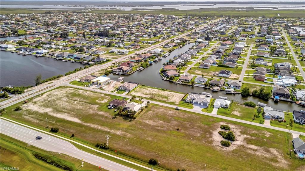 Prime Commercial Lot on Burnt Store Road – Exceptional Growth & High Visibility! Seize the opportunity to own an oversized .29-acre commercial
lot positioned directly on Burnt Store Road, one of Cape Coral’s most active and fastest-growing commercial corridors. With recent road widening
and sidewalks completed by the City, this site is primed for development and offers unmatched exposure. This parcel delivers outstanding visibility
and access, with current traffic counts of approximately 14,000 vehicles daily (FDOT) and projections of 32,000+ vehicles per day by 2045. The
property sits in the heart of a booming growth area surrounded by active and planned commercial projects, including shopping centers, office
parks, medical facilities, and mixed-use developments. Whether you’re an owner-user seeking a premier location for your business or an investor
looking for a high-demand commercial site, this property checks all the boxes. Ideal uses include office, retail, medical, or other commercial
ventures. With Cape Coral experiencing rapid expansion, this corridor is drawing strong interest from regional and national developers—making this
the perfect time to secure your place in one of Southwest Florida’s most promising commercial zones. Don’t miss this rare chance to claim a highly
visible property in the path of progress