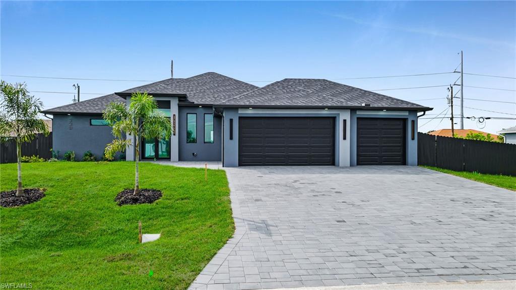MODERN LUXURY MEETS RESORT-STYLE LIVING! Prepare to fall in love with this breathtaking new-construction home in Cape Coral, where contemporary elegance meets the ultimate Florida lifestyle! Offering approximately 1,900 sq. ft. of living space, this stunning residence features 3 bedrooms, 3 full bathrooms, a versatile den, soaring ceilings, and walk-in closets in every bedroom. The thoughtfully designed third bathroom offers convenient access from both inside the home and the pool area.

Step outside to discover your own private oasis, featuring a beautiful pool, and a beach-style lounging area right inside the pool. The outdoor kitchen sets the stage for unforgettable gatherings and year-round Florida enjoyment. Situated on a rare triple lot with a fully fenced yard, this exceptional property offers plenty of room for your boats, jet skis, recreational vehicles, and all your favorite outdoor toys! A spacious 3-car garage, an oversized driveway, and an irrigation system complete this remarkable home.

IT’S YOUR OWN PRIVATE RESORT—WHERE MODERN ELEGANCE, SPACE, AND THE FLORIDA LIFESTYLE COME TOGETHER!
