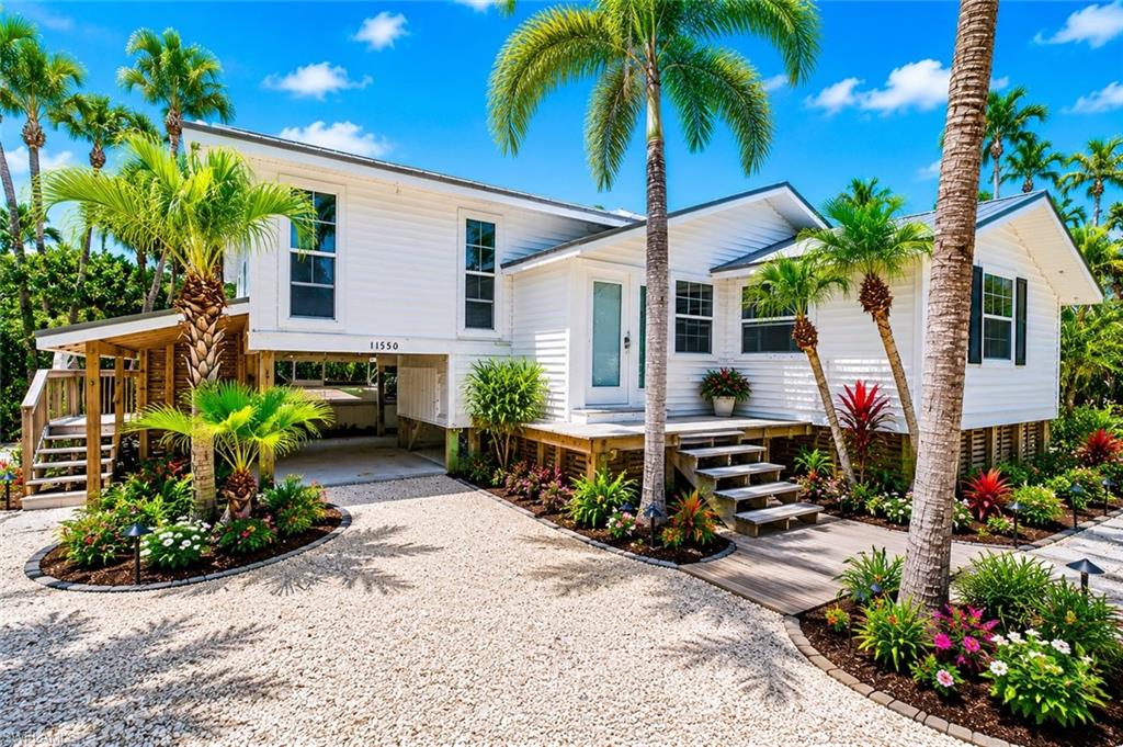 Steps to the incredible Captiva Island beach, this fabulous beach cottage features a screened pool and plenty of space for you and your guests. Located at the end of a private shell drive, the beach is just steps away. This elevated home has a metal roof and screened lanai. With "white box" finishes this is your opportunity to create the beach cottage of your dreams. Much of the new plumbing, electrical, insulation, ductwork, drywall and flooring are complete. The restaurants and shops of the Captiva Village are nearby and enhance the walkable island lifestyle. Perfect for an investment property, seasonal home or year round residence, this is an incredible offering! The home next door at 11546 Laika Lane is available for purchase as well. With two contiguous properties in this amazing location, there is unbelievable potential!