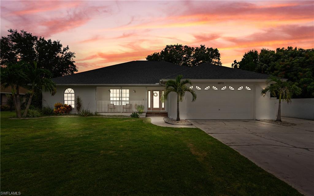 Welcome to 6872 Fairview St, a beautifully updated 4 bedroom, 2 bath concrete block home offering 2,297 square feet of living space with vaulted ceilings in one of Fort Myers' most convenient locations and NO HOA! Tucked at the end of a quiet street, this home has major updates including roof (2022), AC (2024), pool heater (2022), plumbing (2021), new dishwasher and water filtration system (2026), and a full yard irrigation system installed in 2023. Out back, the fully FENCED yard and mature landscaping create a private retreat perfect for entertaining, pets, or simply enjoying the Florida lifestyle around your pool and spa. The oversized driveway includes additional side parking, great for a boat or extra vehicles, and the front yard's bermudagrass is ready to be turned into a putting green for any avid golfers. The 33966 zip code puts you minutes from Colonial Boulevard, Six Mile Cypress Parkway, and quick access to I-75, making commutes and errands a breeze. Shopping, dining, and entertainment are all close by, with Gulf Coast Town Center, Bell Tower Shops, and RSW International Airport all within a short drive. This is a move in ready home with all the big ticket items already handled! Book your showing today!