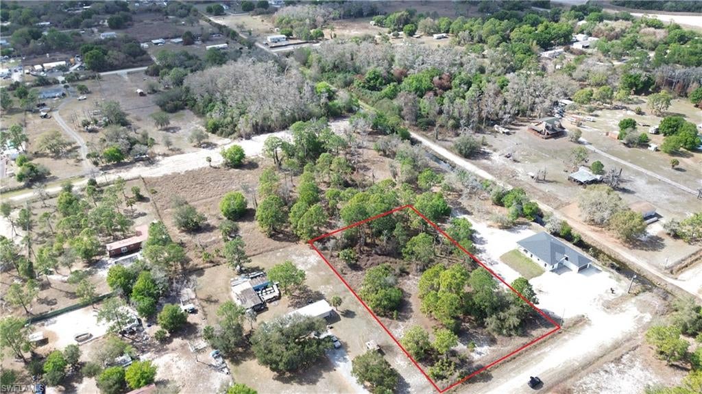 1.25 ac available for sale in Montura Ranches located off Bald Cypress Ave and N Jinete ST. Measuring about 165x 330, this parcel allows for Single and Double Manufactured Homes, Modular or site-built homes. This is a rural horse and golf-cart friendly growing community with NO HOA's. Residents have access to a community clubhouse and poolhouse. 1.5hr from each coast. 25 min from the city of Clewiston. Pay no city taxes. Will need septic, well and culvert. Rear parcel is also available for sale for a total of 2.5 acres, check out listing MLS:2026043194