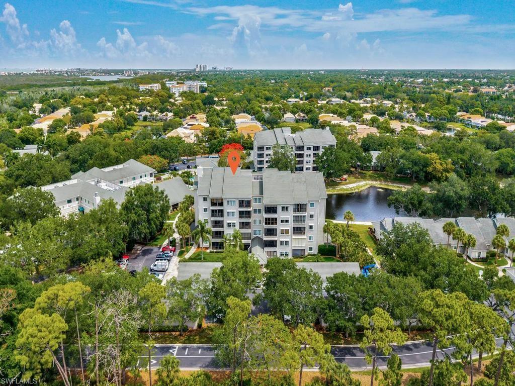 Amazing lake w/ fountain view! Water view from main living area & every bedroom in the home. Comfortable floor plan w/ a COMPLETELY RENOVATED featuring 3 beds, 2.5 baths, 1-car detached garage, 4th floor unit right off the elevator, an open concept living layout, beautifully updated baths, modern kitchen, sleek shaker cabinets, stainless steel appliances, and tile flooring. Lives like a single family home w/o any of the maintenance worry, plus it is MOVE-IN READY.  Your front door is just steps away from the elevator which has large foyer/sitting area, and the building is 24/7 secure. Arbor Trace is a resident-owned community that offers exceptional amenities, including a resort-style heated pool, fitness center, tennis/pickleball, bocce courts, a golf putting green, two libraries, special events, and gourmet dining at the clubhouse. Residents have access to benefit from comprehensive support services such as 24-hour medical monitoring, enjoy transportation to medical appointments, shopping, and group outings. All utilities (including electric/cable/internet) & meal plan are included in the HOA fees. Arbor Trace is a vibrant 55+ community that offers the unique advantage of deeded condominium ownership with 100% equity and no financial or medical requirements, allowing you to rent, sell, or pass your home to your heirs. Enjoy peace of mind with an onsite continuum of care if needed!