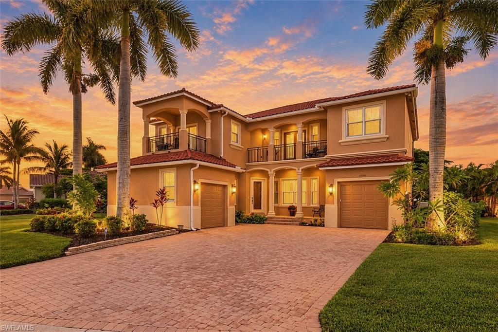 THIS IS LUXURY WATERFRONT LIVING AT ITS FINEST!!
Welcome to this exceptional two-story residence offering over 3,500 square feet of meticulously maintained living space, featuring 4 bedrooms, 4 bathrooms, 3 car garage not to mention the sparkling pool, and breathtaking lake views. Oversized lot. Lovingly cared for and thoughtfully upgraded, this home was NEVER intended to be sold, making it a rare opportunity for the next fortunate owner. 
Designed for both elegance and everyday comfort, the interior showcases crown molding, plantation shutters,beautiful 20" x 20" tile flooring, 5-inch baseboards, field stone accent walls, and stunning French doors, Volume ceilings Anderson Hurricane Windows throughout.  The Light and Bright gourmet kitchen is truly the heart of the home, boasting solid wood cabinetry, granite countertops, a stylish backsplash, center island, all-new Bosch appliances, double oven, a walk-in pantry, and an additional pantry complete with convenient pull-out shelving.
The luxurious primary suite serves as a private retreat, featuring a spa-inspired bath with a relaxing soaking tub accented by field stone details, a spacious walk-in shower, and an extraordinary California-style walk-in closet that is sure to impress and blow you away. Both the primary and guest suites enjoy private patios with picturesque views, while the upstairs sitting area is ideal for relaxing, hobby area or just a great way to get away and it opens to an additional balcony, providing the perfect place to unwind and take in the tranquil surroundings.
The outdoor living area offers equally impressive and an entertainers dream with is with a newly installed hurricane-rated picture-frame pool cage so that you are able to have unobstructed views of the peaceful and tranquil lake. heated salt water pool, and beautifully enhanced landscaping. Recent updates offering peace of mind:  2023 roof, new roof vents, whole-house generator (2025), pool heater (2025), hot water heater (2025), first-floor A/C replacement (2025), two-zone air conditioning system, whole-house water filtration system. Brand new shrubs, and Christmas tree palms to give the home great curb appeal.
Ideally located near Southwest Florida's pristine beaches, including Fort Myers Beach, Sanibel Island, Captiva Island, and Bunche Beach, this remarkable property combines luxury, location, and exceptional quality. Every detail has been carefully considered, creating a home that is as beautiful as it is functional. This is Florida living at its finest.