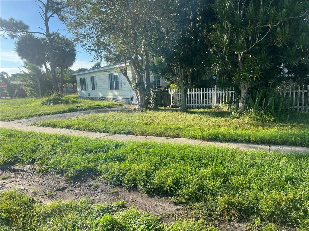 Explore the potential of this 2-bedroom, 2-bathroom manufactured home offering approximately 960 square feet of living space on a 0.22-acre corner lot in Clewiston, Florida. Built in 1995, the property features central heating and air conditioning, a deck, and mature landscaping. Conveniently located near Clewiston High School, this home is ideal for investors seeking their next project or first-time buyers looking for an opportunity to make a home their own. With some TLC and personal touches, this property offers the potential to add value and create a space that fits your vision. Don’t miss the opportunity to explore the possibilities