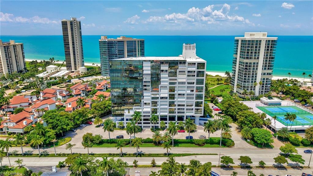 Welcome to your elevated coastal escape above the beauty of Naples.

Perched high above Park Shore in the prestigious Terraces at Park Shore, this exquisitely remodeled penthouse residence offers a truly unforgettable vacation experience with panoramic views of Venetian Bay and the sparkling Naples skyline. From breathtaking sunrises over the water to glowing city lights in the evening, every moment in this sky-high retreat is framed by a spectacular backdrop.

Thoughtfully designed with modern luxury in mind, this stunning two-bedroom, two-bath residence features an elegant open-concept living space surrounded by floor-to-ceiling glass, allowing natural light and endless views to become the centerpiece of the home. Step out onto the private balcony to enjoy your morning coffee, take in the peaceful coastal breeze, or unwind while watching the beauty of Naples come alive below.

The beautifully appointed kitchen features custom cabinetry, premium finishes, and high-end stainless steel appliances, creating a stylish space for preparing meals or entertaining. Every detail throughout the residence reflects a refined coastal aesthetic designed for comfort and relaxation.

The spacious primary suite offers a peaceful retreat with a king bed, generous closet space, and a luxurious ensuite bathroom featuring a spa-inspired walk-in shower. The guest bedroom provides flexibility and function with a queen Murphy bed—perfect for additional guests, remote work, or a quiet reading nook. A second full bathroom with a walk-in shower offers convenience and comfort.

Beyond the residence, enjoy the exceptional amenities of Terraces at Park Shore, including private beach access, a heated pool and spa, outdoor kitchen and grilling areas, fitness center, steam room, social spaces, and 24-hour security. Spend your days strolling along the private beach promenade, relaxing poolside, or exploring the nearby dining and boutiques of Venetian Village and Waterside Shops.

Whether you’re searching for a peaceful coastal retreat, a seasonal escape, or a luxurious Naples getaway, this penthouse offers the perfect blend of breathtaking views, upscale comfort, and an unbeatable Park Shore location.