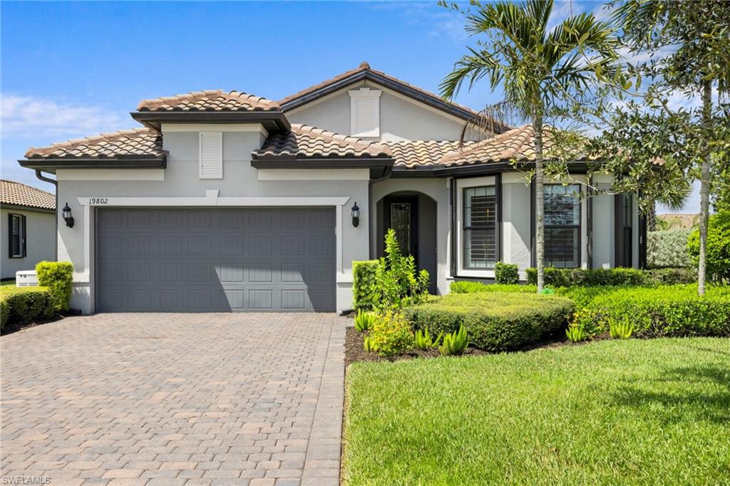 This pristine Pulte Summerwood floorplan sits on huge corner lot, featuring 3 bedroom 
2 Full Baths & Extended Tandem Garage w/built-in workshop offering over $150k in custom upgrades. The expansive lot offers a serene private-park-like setting with ample space for a Pool & Spa, even the option for a fence. This Hurricane Proof home has a sunken 500 gallon propane tank, Whole House Generator, Accordion & Electric Shutters for added protection.  The open concept emphasizes entertainment. Highlighting a Lg Quartz Island leading seamlessly into a massive extended Great room and bar area. Lg covered lanai boast upgraded porcelain tile floors, brand new outdoor kitchen. Additional features include, water filtration system, wood-plank-tile floors, white cabinetry, new custom pantry, California closets, new light fixtures, ceiling fans & a stunning glass door insert. Resort amenities include Pool & spa, 2 tranquil waterfalls, 100' Waterslide, Indoor Restaurant, Outdoor bar, Bourbon Bar, Cafe, 2 story Fitness Center, Movement Studio, Tennis, Pickle-ball, Volleyball, Basketball, Playground, Dog Park, free Childcare, massage therapist, (2) Manned 24/7 gates.