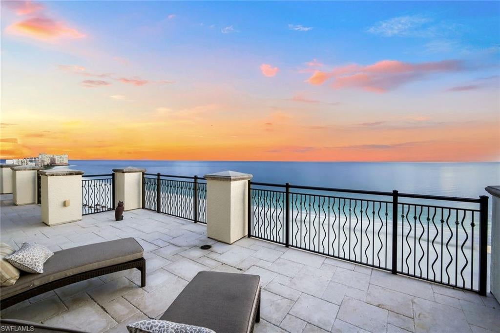 The Peak of Gulf Front Luxury: The Madeira Penthouse. Rarely available and perfectly positioned in the middle of Crescent Beach, this southwest top-floor Penthouse delivers an unparalleled coastal lifestyle with breathtaking 270° views of the Gulf, pristine beach, and the 10,000 Islands from three expansive terraces. The East facing terrace has a natural gas line to accommodate an outdoor kitchen. Having recently finished an exquisite complete renovation, the residence showcases premium contemporary finishes, custom millwork, rich fabrics, and high-end furnishings. This fully furnished sanctuary perfectly blends sophisticated formal entertainment spaces with casual, everyday comfort. This impressive condo features 4 Bedrooms and 5.5 Bathrooms with an expansive floor plan incorporating a family room, den, private office, a unique enclosed terrace flex room, and 3 large terraces. The secluded primary suite is designed as a private sanctuary with two full baths. Three additional ensuite guest bedrooms are positioned for comfort and privacy. The chef’s kitchen is a beautifully appointed culinary space that flows seamlessly into the main living areas. Resort-Style Living at the Madeira includes a guard-gated entry, grand lobby, social room, bar, billiards, movie theater, three dedicated guest suites, a beachside pool, BBQ pavilion, fitness center, tennis, pickleball courts, two garage spaces and extra storage. Located directly next door to the JW Marriott, giving you effortless, walking-distance access to world-class dining, luxury spa treatments, and additional resort amenities.