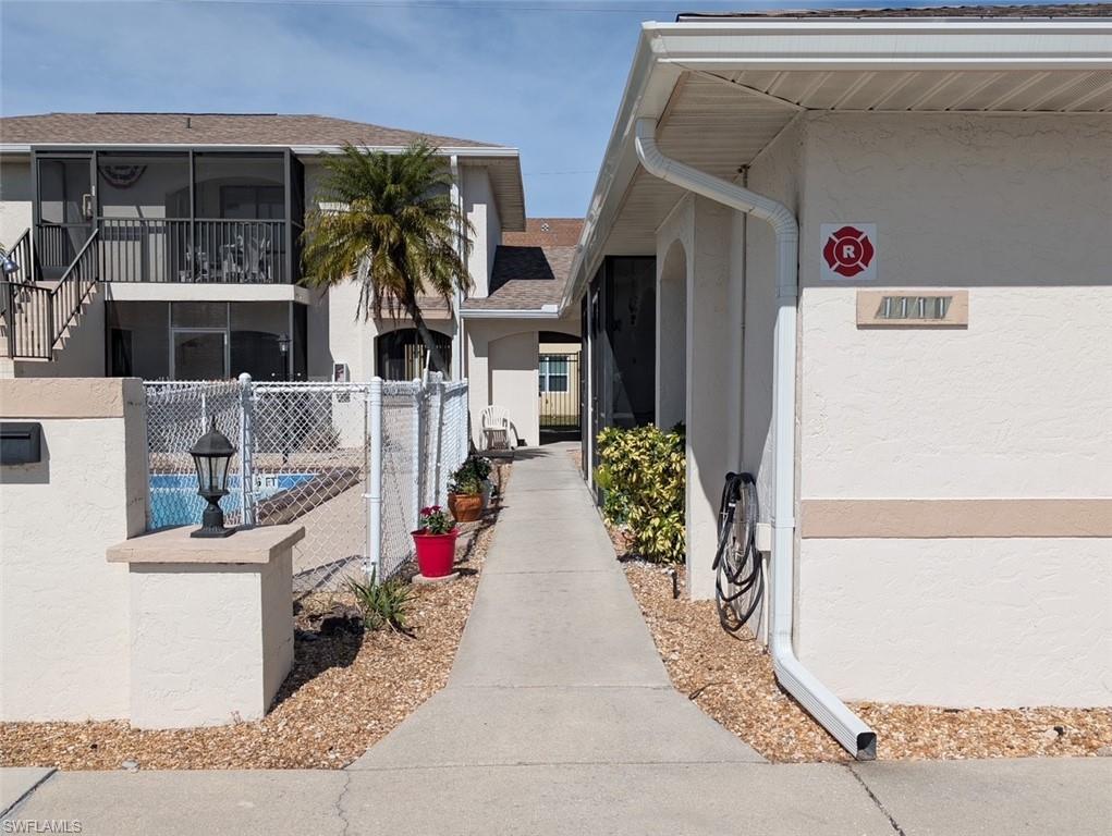 JUST REDUCED $24,000! Well priced and truly move-in ready, this ground-floor 2-bedroom, 2-bath condo is located in a highly sought-after Cape Coral neighborhood, just minutes from Cape Harbour’s restaurants, shopping, and entertainment. The quiet and well-maintained 55+ community features only 10 units and is thoughtfully designed for comfort and accessibility.

The kitchen offers beautiful cabinetry, newer backsplash, updated cabinets and countertops, and a clean, functional layout ideal for everyday living. Both bedrooms are generously sized, with the primary suite featuring a private shower, while the guest bathroom includes a tub/shower combination.

Enter through the screened lanai with privacy shade and enjoy tranquil views of the community pool. Parking is conveniently located directly out front, with ample guest parking available.

Additional highlights include a private laundry closet with washer and dryer, along with plenty of storage for daily needs. HOA fees include flood insurance, exterior maintenance, trash removal, and water.

Competitively priced for today’s market, this condo is ready for immediate enjoyment and offers exceptional value in one of Cape Coral’s most desirable areas.