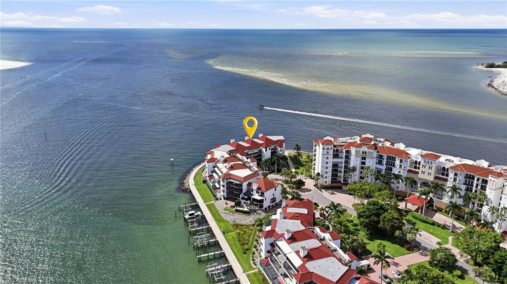 Positioned on the coveted southwestern point of La Peninsula on Isles of Capri, this exceptional waterfront residence offers breathtaking panoramic views of Capri Pass, the Gulf, and Marco Island. Located in the community’s most desirable building, the residence enjoys spectacular sunsets, expansive water views, and frequent dolphin sightings right from its private outdoor living space.

Offering nearly 2,100 square feet of living area, this spacious residence features three full bedrooms and three bathrooms, a highly desirable and rarely available combination that provides exceptional flexibility for both owners and guests. The generous waterfront outdoor living area creates the perfect setting for morning coffee, entertaining, or simply enjoying the passing boats, coastal wildlife, and unforgettable sunsets.

Offered fully furnished, the residence provides an effortless opportunity to embrace the Southwest Florida waterfront lifestyle. Additional highlights include convenient assigned under building parking and the privacy of a gated community.

With its premier point location, expansive southwest facing views, generous three bedroom floor plan, and exceptional waterfront setting, this residence represents a unique opportunity to enjoy the beauty and tranquility of Isles of Capri, just minutes from Marco Island and Naples.