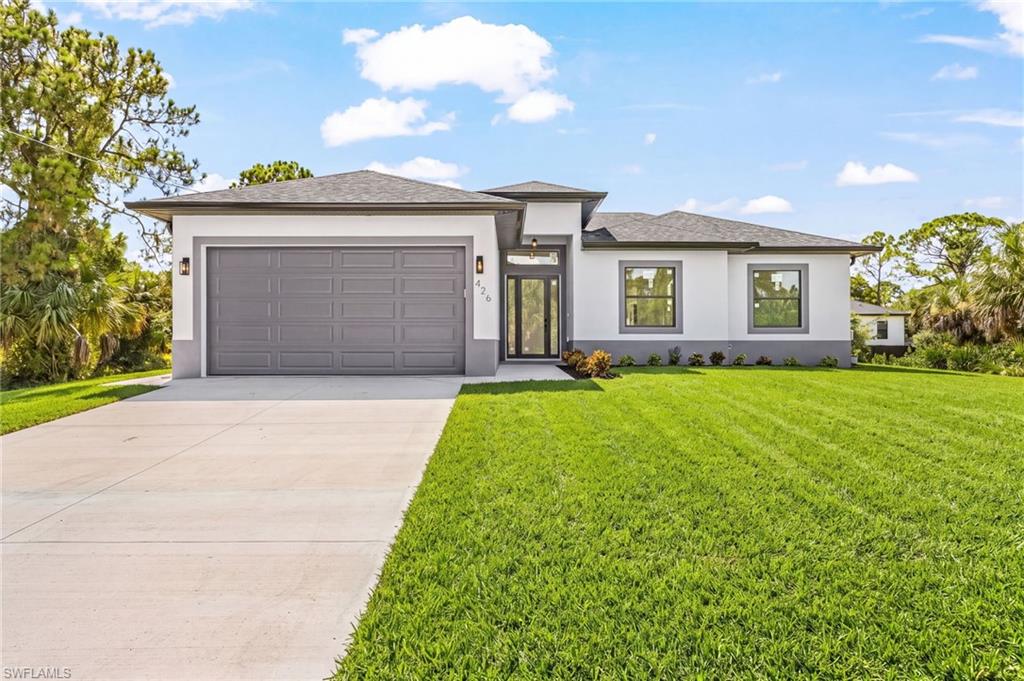 Welcome to your dream home in Lehigh Acres! This stunning single family home boasts 3 bedrooms, 2 bathrooms, and a 2 car garage. The kitchen features quartz counters, stainless steel appliances, and 42" cabinets, making it a chef's paradise. The tile flooring throughout the home adds a touch of elegance.High ceilings and impact windows and doors create a bright and airy atmosphere, while LED lights add a modern touch.The master bathroom is a true oasis with a large shower, and quartz countertops. The walking closets ensure you plenty of space for all your wardrope. Step outside to the tile lanai and enjoy the Florida sunshine in your private oversized backyard with a sprinkler system for easy maintenance. This new construction home has everything you could want and more, making it the perfect place to call home. Don't miss out on this opportunity to live in luxury and comfort!*one or more pictures are virtually staged* MOTIVATED SELLER!!! Seller concessions available!!! Easy commute as is only 5 minute from SR-82.