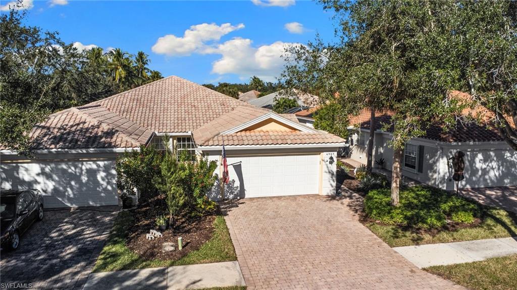 Opportunity Knocks!
Welcome to this beautiful 2-bedroom, 2-bath DiVosta built Capri model, perfectly situated on a quiet street in the highly desirable Island Walk community. Offering exceptional privacy, this light and bright poured-concrete home features accordion shutters throughout and a serene, private backyard just beyond the screened lanai.

The popular split-bedroom floor plan includes a spacious great room with a built-in wall unit, ideal for relaxing or entertaining. Additional highlights include central vacuum, an attached two-car garage, and a newer air-conditioning system equipped with a REME HALO air purification system for cleaner, healthier indoor air.

Island Walk is a vibrant, gated community conveniently located near shopping, dining, and Naples’ renowned beaches. Residents enjoy resort-style amenities including a pool, lap pool, fitness center, tennis and pickleball courts, a fabulous on-site restaurant, and miles of scenic walking and biking paths.

Come experience the best of Naples living—fall in love and move right in!
