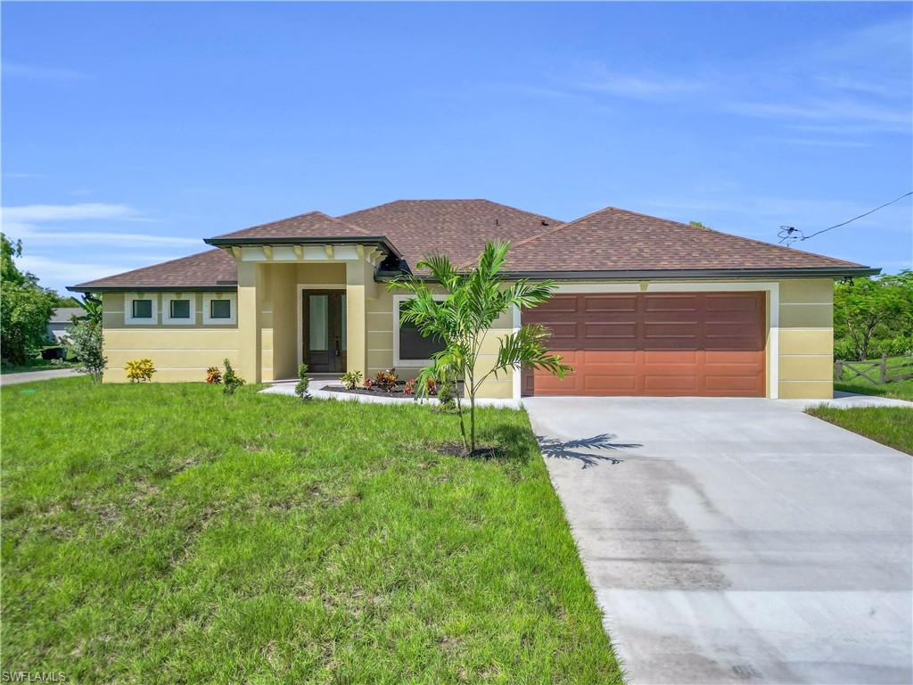 Location location! Brand new corner custom home 4 Bed 2 Bath. Great neighborhood of newer homes adjacent to Buckingham about 4 blocks to Harns Marsh Elem & Middle Schools and near local High School. Upscale stunning features everywhere! Porcelain tile floors throughout including lanai. Beautiful Master Suite & Bath with dual sinks and HUGE Walk-in Closet. Quartz in the kitchen & baths with 42"soft-close cabinets. Stainless steel kitchen appliances. Tray ceilings (Living/dining/master). Crown moldings & baseboards. 8' entry doors. High ceilings!. Front Interior entry welcomes guests & provides privacy. Front porch/lanai have non-skid porcelain tile floors. HUGE Lanai has "picture window" screen and an extra outdoor kitchen to entertain family and friends. Master w/large rain shower. Room to add your HUGE pool. Oversized garage w/epoxy coated floor 22' long for that pickup. WIFI garage door. Sprinkler system. In-house Laundry. Convenient to restaurants, stores, schools, & I-75. Easy ride to Ft Myers. NO FLOOD INSURANCE REQUIRED! 1 yr warranty included.