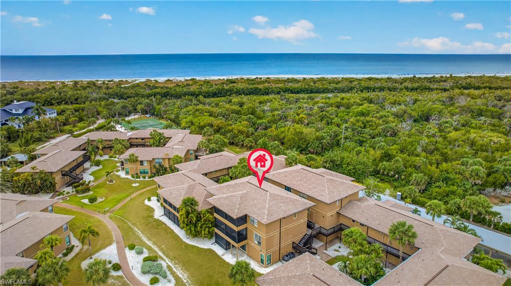 Located on the West end of Sanibel, Blind Pass has always been an iconic complex with many families coming year after year. Great opportunity to purchase a completely remodeled "Blind Pass" island get-a-way. New plank tile flooring in main living area and both bedrooms have new carpet. New soft gray cabinets, quartz counters, light blue custom back splash and stainless-steel appliances in the kitchen. New impact windows and doors throughout. Beautiful custom bathrooms with quartz vanities, walk in showers with glass doors. Brand new decorator furnishings and recessed lighting! The condo is situated in a convenient location within the complex, close to the pool, tennis courts, clubhouse and carport. Close to JN Ding Darling Wildlife Refuge for epic bird watching and bike trails, private deeded beach access to Bowman's beach with "World Famous" shelling and Sanibel's fantastic sunsets.  Enjoy wonderful amenities: sparkling community pool, tennis/pickle ball, kayak launch at the Sanibel River, gas BBQ grills, community room and so much more.