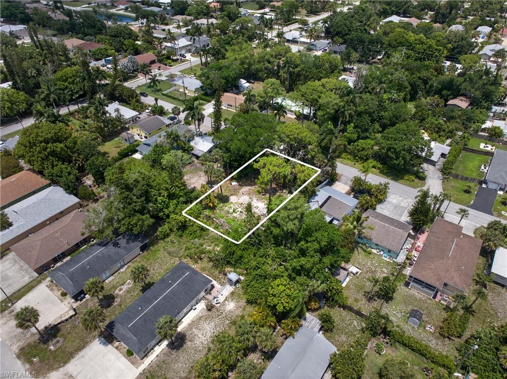 This vacant lot offers the opportunity to build a single-family home in a growing and centrally located area of Bonita Springs. Situated in an established neighborhood with no HOA, the property provides convenient access to Downtown Bonita Springs, beaches, dining, and major roadways, while still offering a quiet, tucked-away setting.

Located just minutes from the upcoming Midtown at Bonita — a 68-acre mixed-use development bringing new retail, dining, and new energy to the area — this property is well positioned for both end users and investors looking to build now or hold for future value.

The lot presents an excellent opportunity to design a high curb-appeal home with rear alley access, allowing for a clean front elevation and thoughtful layout. The site supports the potential for a 2,000+ sq. ft. single-family residence tailored to your vision.