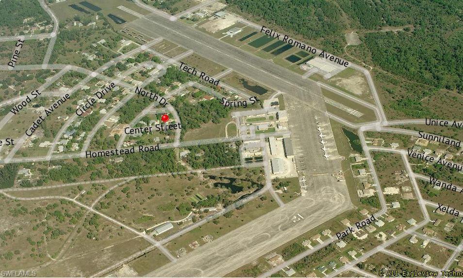 FLY IN AND OUT FROM YOUR HOME. Lots 6–9 in historic Buckingham Air Park combine into one 0.592-acre homesite, one of the last remaining in this rare fly-in community. Taxi from your own hangar on shared aircraft and vehicle roads to FL59, Buckingham Field, with a 4000-foot-long concrete runway built on the former WWII Buckingham Army Airfield. The lot site is about 50% larger than a typical airpark lot, with room for one, maybe two custom homes and attached airplane hangar. Zoned AG-2, with well and septic, modest HOA dues and low taxes. Join a close-knit community of pilots in the rural Buckingham area, about 13 miles from downtown Fort Myers, with quick access to I-75. Very Rare opportunity. Buyer to verify deed restrictions, hangar requirements and runway access terms.
Join a Community of Pilots - At Buckingham Air Park, aviation is what brings neighbors together. Residents come from many backgrounds, and one longtime resident described aviation as "the central thread" binding the neighbors together and "an equalizer." And the best part: Orlando, the Keys, the Bahamas and the rest of Florida are only a flight away. You'll leave from your own front door.