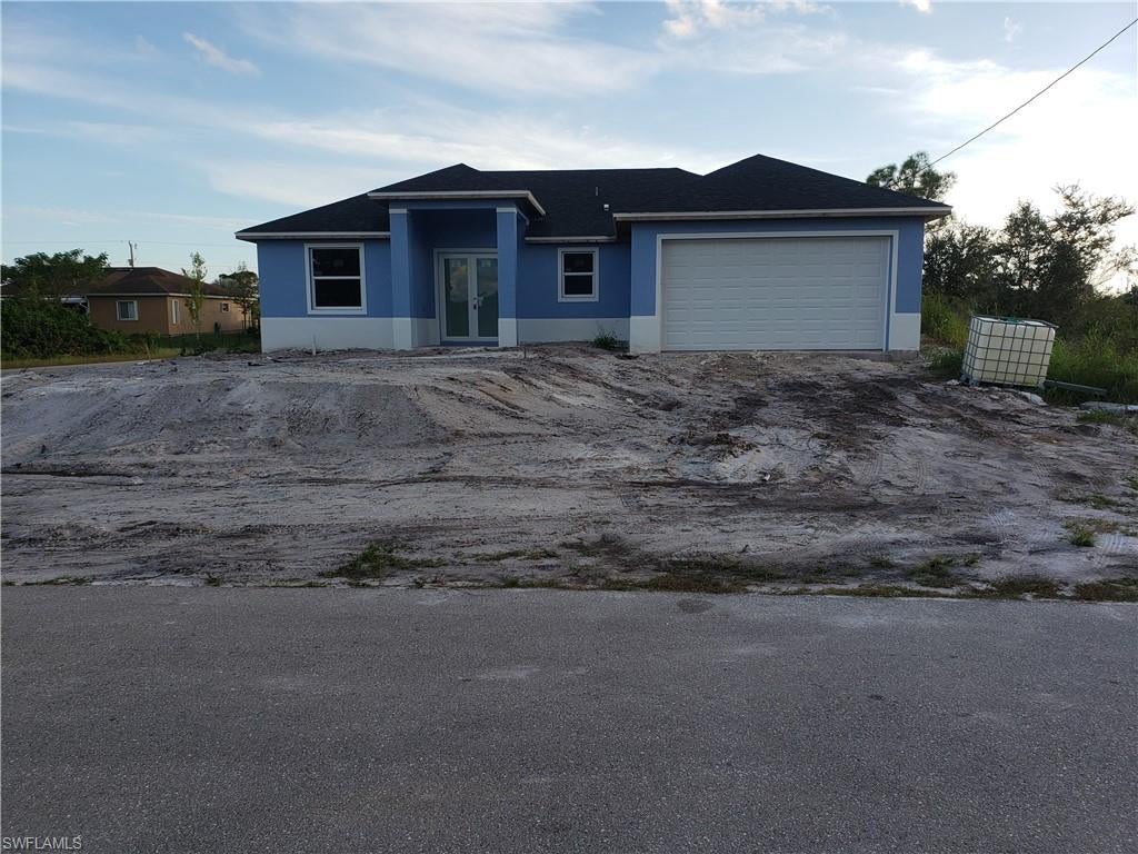 Wonderful corner house!! New Construction with beautiful porcelain tile 32x32 throughout the whole house, Granite countertops in kitchen and bathroom, tall modern cabinets, tray ceilings in the living room and master bedroom, stainless steel appliances. Storm impact windows and doors. High strut, elegant 8-foot doors. Also, glass doors in both shower. 
This house has everything you need.