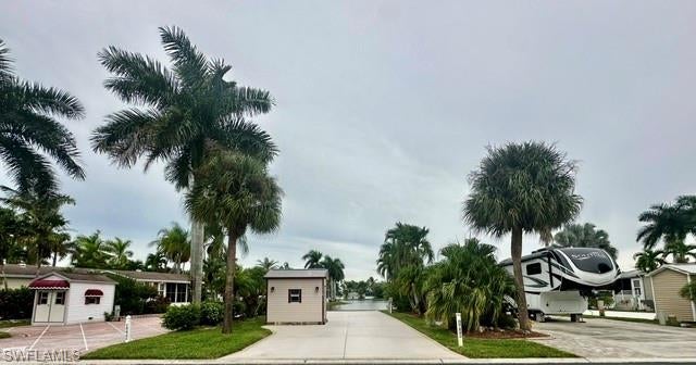 Enjoy an incredible long lake view from this beautifully situated 35' x 70' RV site on the south side of Silver Lakes RV & Golf Resort’s second lake. The location offers a wonderful open and spacious feeling, making it an ideal spot to relax and enjoy the beautiful Southwest Florida surroundings. This attractive painted site features dual hookups, providing added flexibility and making it a great choice for motorhomes, fifth wheels, or travel trailers. A 6' x 10' storage shed with washer and dryer is included, along with patio furniture, so you can start enjoying your new piece of paradise right away.  The real highlight of this property is the spectacular lake view as a beautiful backdrop for morning coffee, outdoor entertaining, or simply relaxing and watching the Florida sunsets.
Whether you're looking for a seasonal getaway or your own place to call home in Naples, 1318 Silver Lakes Blvd. offers a fantastic combination of location, convenience, and waterfront views. Bring your RV and start enjoying everything Silver Lakes RV & Golf Resort has to offer! This property is currently rented from January through March 2027, and the existing rental agreement will remain in place and be part of the sale. The buyer will be required to honor the existing rental for this period. Community amenities include a 9-hole golf course, two spacious clubhouses, three swimming pools, two hot tubs, pickleball courts, tennis courts, fitness center, bocce ball, shuffleboard, horseshoe pits, billiards, and ping pong. Whether you enjoy staying active, relaxing by the pool, playing a round of golf, or socializing with friends and neighbors, Silver Lakes offers something for everyone. Just a short drive from downtown Naples, Marco Island, and the beautiful white-sand beaches of the Gulf, this property offers the perfect combination of relaxation, recreation, and the Southwest Florida lifestyle.