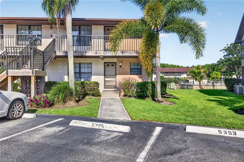 Bright second floor end unit overlooking the community lake close to downtown Naples and Marco Island.  This unit has split bedrooms and screen lanai.