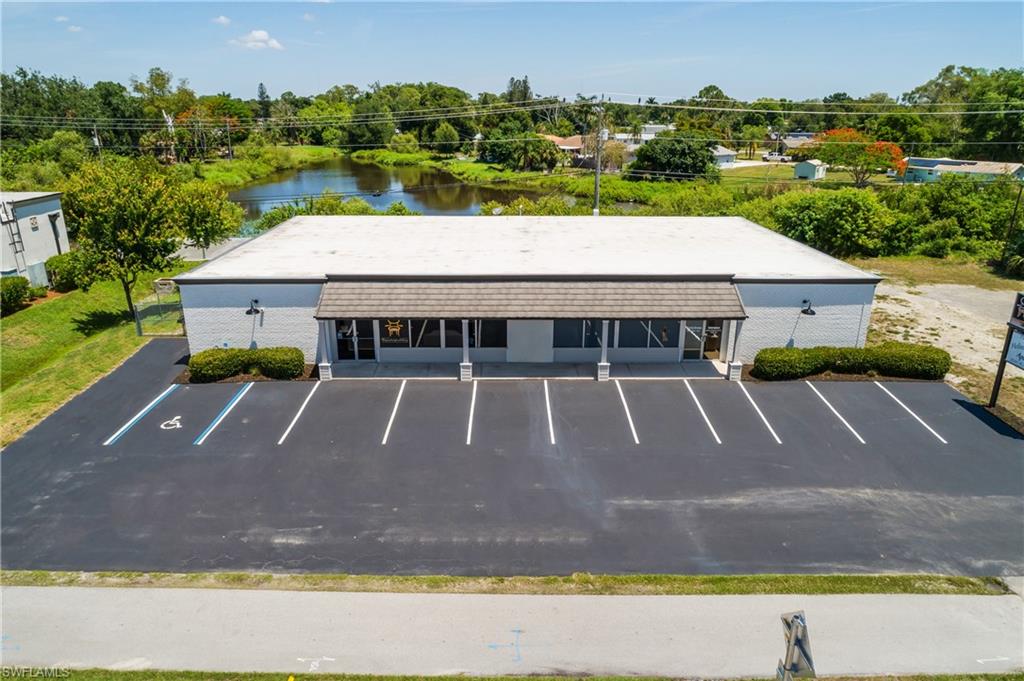 Commercial Building
12538 & 12546 Palm Beach Blvd. Fort Myers Fl 33905
6,000 sq ft recently painted 2026 new roof 2024 sign is grandfathered.
Lot 175 frontage on Rt 80 lot depth 120’ 12 parking spaces with additional parking on vacant lot and behind building. Hurricane shutter covers entire front  of building.
?Two 10’ bay doors, two rear ground level doors.
Extra lot (total acreage.48 included in price 2.2mm.
Building can be vacated with signed P&S (30-60 days negotiable) closing.