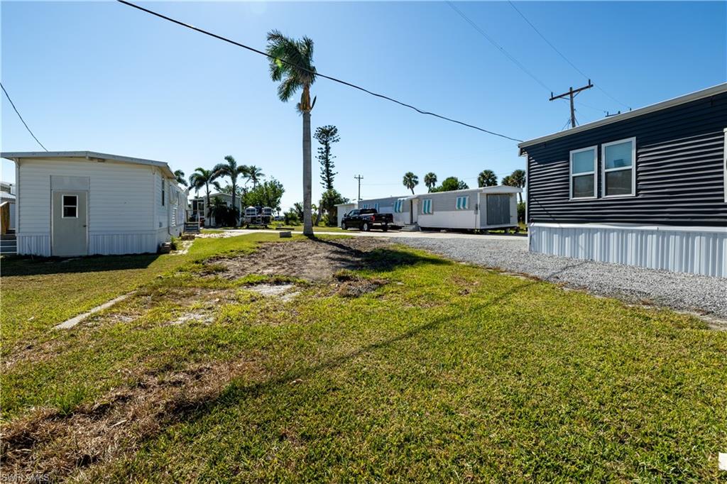 Discover your dream retreat at 16978 Captains Dr, Bokeelia, FL, in the vibrant 55+ Co-Op community of Cap-N-MAC'S. Nestled on the serene north end of Pine Island, this charming community boasts 31 units with exceptional amenities. Enjoy exclusive access to a spacious common area on Charlotte Harbor, perfect for taking in the  breathtaking sunsets. Fishing enthusiasts will love the private 407' pier, while boating enthusasts can take advantage of the convenient boat ramp. Plus, boat slips on the tranquil back bay are available for rent on a first-come, first-served basis. Experience the tranquil island lifestyle you've always dreamed of!