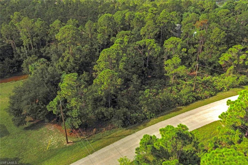 Prime residential lot opportunity in Punta Gorda, Charlotte County, located at 27369 N TWIN LAKES DR. Situated in a desirable residential area, this property offers convenient access to Bissett Park (approximately 0.22 miles), another park (2.05 miles), Punta Gorda (6.64 miles), along with other nearby points including Cardtronics (1.56 miles) and Blanton Brothers (1.36 miles). The lot has no wetlands near the property, so there are no regulatory restrictions, permitting delays, or mitigation requirements related to wetlands for building, allowing for full lot utilization without environmental buffers. It is located in Flood Zone D, which indicates areas with possible but undetermined flood hazards; building is generally allowed without mandatory federal flood insurance, but you may face higher private insurance costs, potential lender requirements for elevation studies, and local zoning rules that could require additional site assessments or flood-resistant design to minimize risks. Zoning must be looked up per parcel via official GIS or city records. Contact the Punta Gorda Planning Division for verification and allowed residential uses (single-family, multifamily, etc. vary by district). This is not official advice. Buyer should verify all zoning, setbacks, utility availability, and development requirements with the Punta Gorda Planning Department. The property is available for a self-guided tour. Subleasing is not permitted. This lot is not available for rent or lease.