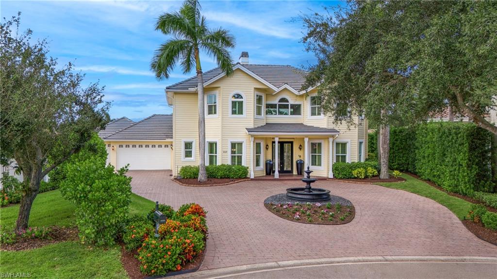 The ultimate in Naples and Florida living is ready for you. Boasting nearly 3,600 sq. ft. of living space and 4,744 total construction including the 3 car garage, this rarely available 2-story concrete block residence with plenty of natural light, offers 4 bedrooms + den/ 5th bedroom connected to full bath and all main floor counters and faucets have been updated in the past 30 days. There are 4.5 baths in total, including pool bath. This home represents an exceptional market value, priced below recent appraisals and comparable sales, offering buyers a rare opportunity to own a property enhanced by hundreds of thousands of dollars in thoughtful upgrades. The heated saltwater system pool, jacuzzi, 3-car garage, and cul-de-sac location provide both luxury and privacy, while direct access to North Collier Park and top-rated schools make this ideal for families. No detail was overlooked: new light fixtures, fresh paint, and modern upgrades enhance every corner of this stunning property from top to bottom. The grand foyer with soaring ceilings leads to the formal living area, while all new impact-resistant doors and windows ensure peace of mind. A newer 24kW Generac whole-house generator with a 500-gallon underground LP tank offers up to 5 days of backup power.  The chef’s kitchen features newer LG stainless steel appliances (under extended warranty), gorgeous and brand new quartz counters, a large walk-in pantry, and chic functional style. In the North wing, the first-floor primary suite is a true retreat, with a double vanity, double walk-in closets, separate tub and walk-in shower with double shower heads, and private access to the enclosed lanai, also, the den/office, large formal dining room, formal living room and a family room. Upstairs, two guest bedrooms share a Jack-and-Jill bath, and an ensuite offers abundant natural light and privacy, along with a custom built-in bookshelf for the avid reader.  Resort-style living continues outdoors with 145 feet of west-facing water views, a saltwater pool and spa, built-in outdoor kitchen with 8-burner gas/charcoal grill and refrigerator, powder room, and covered lanai perfect for entertaining. The 3-car garage includes epoxy flooring, AC, and extra storage. Additional upgrades include brand new LG washer/dryer, whole-house spring water reverse osmosis  filtration and UV system, 2023 HVAC system, and a 2019 Tile Roof, fountain, paved circular driveway, automatic irrigation system, automatic front door, and lanai patio hurricane roll down shutters.  Wilshire Lakes offers the ultimate in luxury, man-guarded 24 hours security gate, located less than 6 miles from the pristine white-sand Naples beaches, nearby shopping, fine dining, entertainment, west of I-75, rate A school zone and much more... —this home is truly a gem!