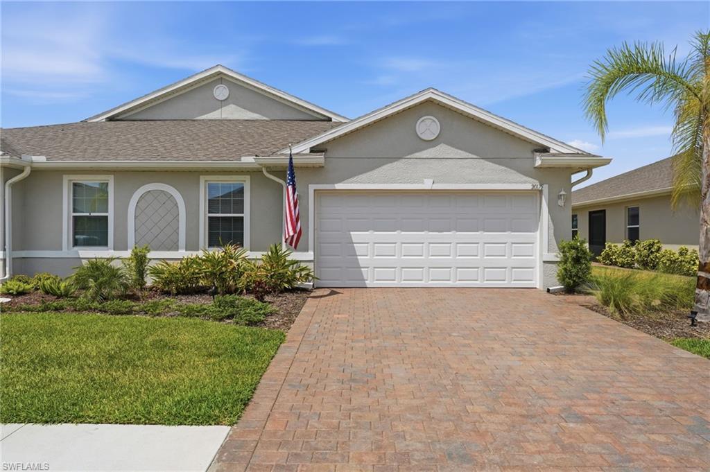 RESORT-STYLE LIVING, PEACEFUL PRESERVE VIEWS, A LARGE FENCED YARD, & LOW-MAINTENANCE VILLA — all tucked away on a quiet cul-de-sac street within the gated community of Magnolia Landing. This UPGRADED, MOVE-IN ready VILLA is available FURNISHED.  Inside, the bright open-concept kitchen, dining, and living areas are designed for both entertaining and everyday comfort. The upgraded kitchen features white cabinetry with updated hardware, an upgraded backsplash, pantry, snack bar seating, and added knee wall protection for style and functionality. Gorgeous gray plank tile flooring flows throughout the main living areas and is complemented by upgraded lighting, ceiling fans, updated bath fixtures, and sealed tile grout. The spacious primary suite offers a relaxing retreat with a custom glass shower enclosure. Outdoor living is equally inviting with a SCREENED IN LANAI overlooking tranquil preserve views and a partial water view — the perfect setting for morning coffee or evening relaxation. Additional upgrades include a SCREENED ENTRY, sealed driveway and walkways, gutters around the perimeter, epoxy-finished garage floor, and a large, fenced yard ideal for pets, outdoor enjoyment, or added privacy. ***Best of all, the HOA provides exceptional low-maintenance living by covering lawn care, exterior pest control, exterior building maintenance, and roof maintenance, along with roof and exterior paint reserves for additional peace of mind.*** Residents of Magnolia Landing enjoy RESORT STYLE AMENITIES including a resort pool, lap pool, fitness center, PICKLEBALL, bocce ball, shuffleboard, dining, and a full calendar of community activities. Available furnished — move right in and start enjoying the Florida lifestyle!