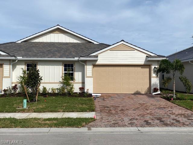 This magnificent twin villa features 2 Bedrooms + Den, 2 Bathrooms, & a spacious 2-car garage. The kitchen is a true centerpiece, featuring white quartz countertops & Whirlpool, stainless steel appliances. Not only does this home offer exceptional style & comfort, but it also prioritizes safety & durability- with Smart Home technology & impact-resistant windows, you can have peace of mind during stormy weather conditions. The low HOA fee at Enbrook gives you access to the incredible amenities of the clubhouse which include pool, 
tennis courts, basketball hoops, bocce ball, exercise room & pickle ball. Just a 15 minute drive and you'll find the charming Olde Naples, 
renowned for its exquisite dining, upscale shopping, & pristine beaches. Or if you're seeking a day of leisure, Marco Island's beautiful 
shores are also within easy reach.