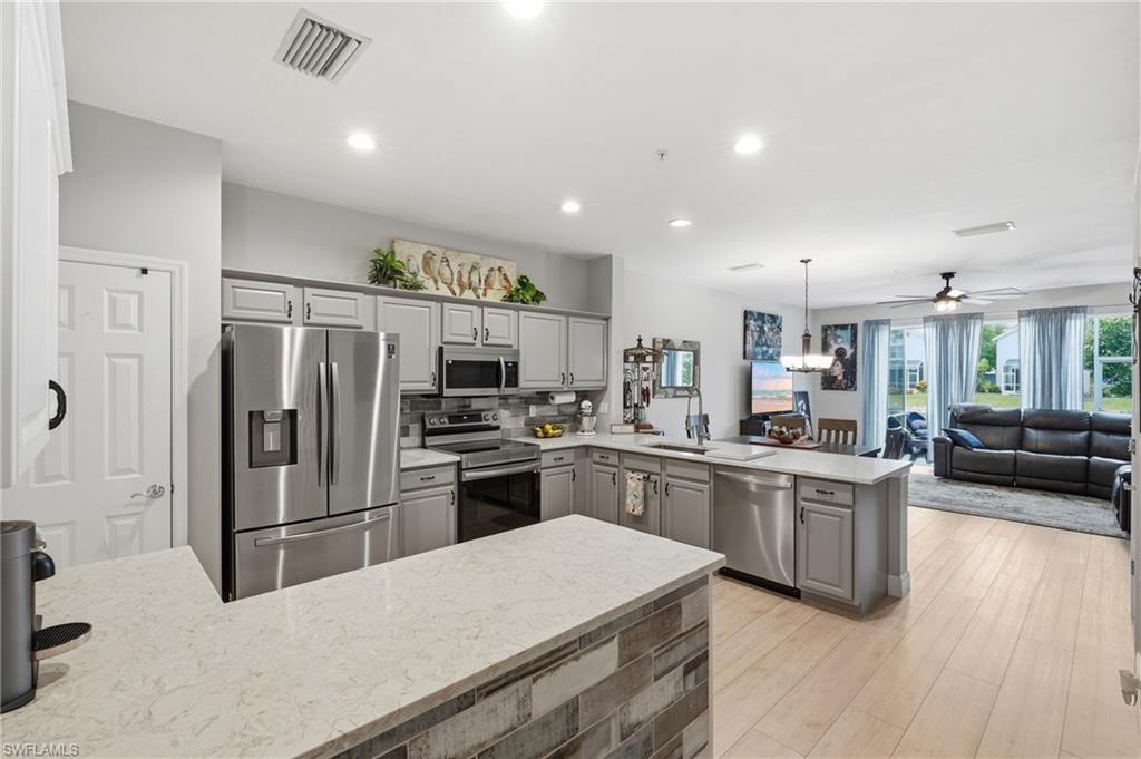 Thoughtfully Upgraded MILANO Townhome Well Beyond the Standard Floor Plan.
Welcome to this beautifully maintained home offering peaceful lake view creating a picturesque setting to enjoy every day. 
Milano community is ideally located in North Naples, where you’re minutes from I-75, Wiggins Pass, Vanderbilt Beach, Mercato, Waterside Shops, just less than a mile from Seed to Table, and more—served by Veterans Memorial Elementary, North Naples Middle, and Aubrey Rodgers High School.
   Unlike many comparable homes in the community, this residence has been thoughtfully upgraded with stylish finishes and practical enhancements throughout. The beautifully renovated Kitchen features quartz countertops, freshly painted cabinetry, a designer tile backsplash, crown molding, newer stainless steel appliances, and a custom coffee station with additional cabinetry that provides significantly more storage than the standard floor plan.
The open-concept living and dining areas flow seamlessly to the screened lanai, just added in 2025 where you can relax while taking in the tranquil lake and fountain views.
Additional recent improvements include a new 2026 water heater with pressure regulator, an updated powder room, professionally cleaned air handler and ductwork with mold treatment, and NEWER kitchen appliances—making this home truly move-in ready.
Ideally located just one building from the community pool and convenient GUEST parking, this home offers an added advantage in a neighborhood where visitor parking is limited.
Every upgrade was thoughtfully completed to enhance comfort, style, and everyday living. When comparing homes in the community, be sure to compare the quality of the finishes, storage space, location, and recent improvements—you'll immediately appreciate the difference.
As an added touch, the beautiful artwork displayed throughout the home was created by the seller, a talented artist. Select original paintings are available for purchase, please inquire.