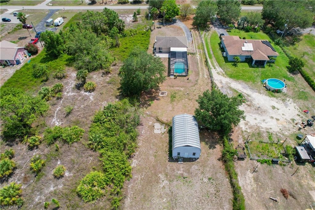 COME AND VISIT THE BEST PRICED ESTATES POOL HOME AVAILABLE! THIS IS A SALT WATER POOL AND IS JUST TWO YEARS OLD. NEW A/C AND WATER HEATER IN APRIL 2023. THIS IS A GREAT HOME FOR A FANTASTIC VALUE. THE OUTBUILDING OFFERS OPPORTUNITIES TO DO MANY DIFFERENT THINGS, AND INCLUDES POWER AND A SLOP SINK.