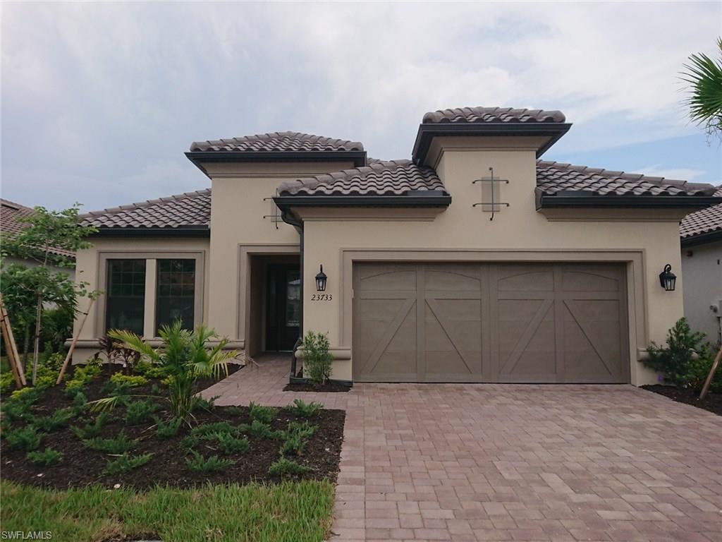 Ready Now!!  Photos of Model Home -The open well designed luxury home lends itself to entertaining with friends and family with many beautiful outdoor living features. The  upgraded kitchen with a separate prep island is definitely the hub of this home. It comes complete with granite, stainless steel gas appliances, 42” upper cabinets and butler pantry. It has a two car with 4 ft extension, extended  lanai with pool waterfall and summer kitchen rough with gas stub-out for outdoor kitchen. Beautiful  Pool area  with pavers.and beautiful upgraded tile floors throughout  in main living area . Very popular floor plan in sought after location. . Show and sell.