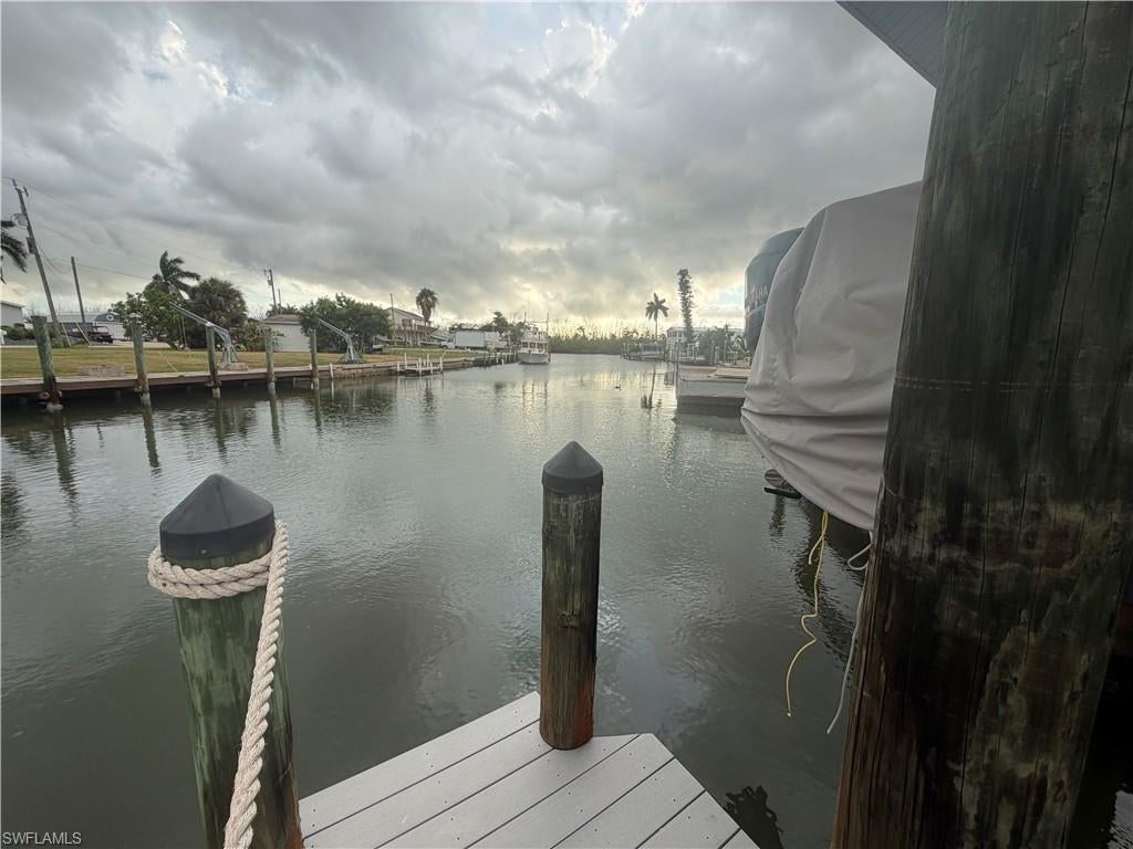 Welcome to your slice of paradise in the highly sought-after boating community of Trailerhaven! This direct waterfront property offers the ultimate Southwest Florida lifestyle with immediate water access right from your backyard. Equipped with a private boat dock and lift, you are just minutes away from exploring the world-class fishing, pristine beaches, and barrier islands of Pine Island Sound and the Gulf of Mexico.