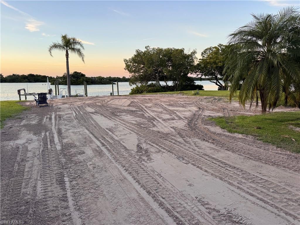 Your Waterfront Homesite Awaits!
Build your new elevated modular home on this beautiful 8,169-square-foot lot, featuring 123 feet of water frontage and panoramic views of the Caloosahatchee River. Imagine relaxing on your porch as the sun sets over the water.
Lot and Boating Features
• Recently re-graded and seeded
• Several palm trees and mangroves along portions of the shoreline
• Existing boat dock and lift, both in need of repair and updating
• Direct access for hours of boating and fishing
Orange Harbor Amenities
Enjoy an active lifestyle in a community surrounded by the Caloosahatchee and Orange Rivers. Amenities include two boat ramps, boat storage, a fishing pier, and a fish-cleaning station.
The monthly maintenance fee is $407 and includes water and sewer, trash removal, fiber-optic internet, lawn maintenance, and access to an abundance of community amenities.
Community Details
Orange Harbor is a pet-friendly, 55+ waterfront community near downtown Fort Myers, Manatee Park, shopping, and restaurants. Each household may have up to two pets; some dog breeds are prohibited, so be sure to review the community rules. ESA and service animals are allowed.
Purchase this lot to own a share in the Orange Harbor cooperative and hold real property. Come see the community and envision your future waterfront home.