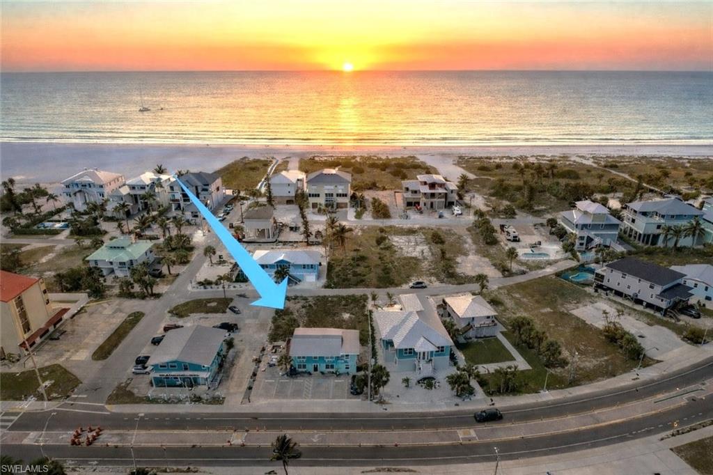 Just a stone's throw to the beach from this uniquely located vacant lot on the Gulfside of Estero Boulevard. Step onto the powder white sandy beach and feel like you are on vacation every day. Great location off the main road, close to shopping, restaurants, and marina at Santini Plaza as well as the island's Publix grocery store. The owner has plans for a two-level home above parking, with decks and a private pool. Survey available. MINIMUM USE DETERMINATION & ZONING VERIFICATION LETTER available. See links for videos of property and new build rendering. One of the best priced properties on the Gulfside of Estero Blvd. Zoned RC, weekly rentals allowed. Don't miss out!