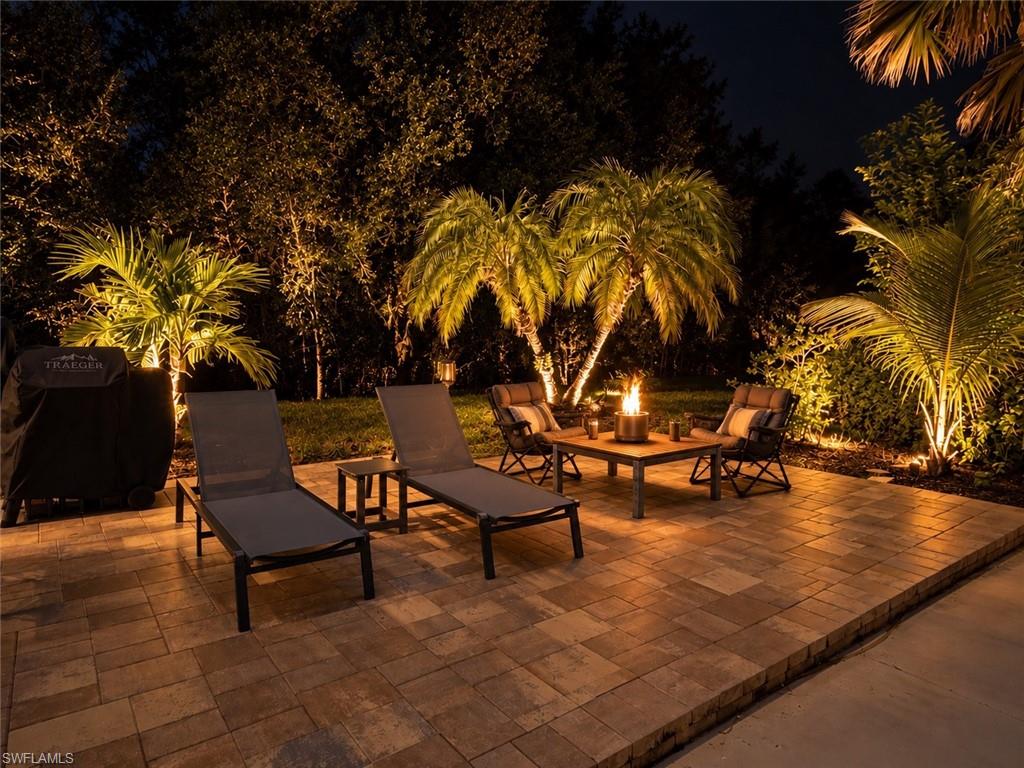 Lot 199 welcomes you to a wonderful spot on a great street leading right into the heart of RiverBend Motorcoach Resort. You’re just down the street from the pool, cabana bar and the good stuff, with seasonal activities, social gatherings and plenty of reasons to wander out for the day and stay for the evening. This charming back-in lot features a beautifully appointed 16' x 24' coach house with an office nook and a versatile loft that offers excellent additional storage space, plus a spacious raised paver patio fully plumbed for an outdoor kitchen. There’s also room to create a beautiful covered lanai and add pavers over the existing concrete pad, giving you plenty of flexibility to personalize this inviting outdoor retreat. Inside, warm Florida sunshine pours through the full wall of sliding glass doors, creating a bright, open and welcoming living space. The stylish kitchenette features top-of-the-line stainless steel appliances, including a refrigerator, dishwasher and microwave/convection oven, while the gorgeous bathroom offers a generous, nicely finished shower. A washer and dryer add everyday convenience, and thoughtfully tucked-away cabinetry keeps everything neat and organized. The comfortable living area is furnished and includes a convenient pull-out sofa for overnight guests. Outdoors, the furniture conveys, giving you an easy place to dine in the shade, grill, lounge and enjoy the beautiful Florida weather. There’s even an outdoor spigot with both cold and hot water, perfect for power washing and keeping your outdoor space looking fresh and tidy. And then there’s RiverBend itself. Set along the scenic Caloosahatchee River, this beautiful resort community offers a lifestyle filled with sunshine, friendships, activities and plenty of ways to enjoy the day. Start your morning with water aerobics or a friendly game of bocce, spend the afternoon lounging poolside or enjoying a refreshing drink at the cabana bar, then let the evening unfold with good friends and beautiful Florida sunsets. Eight pickleball courts, shuffleboard, riverfront gatherings and seasonal activities keep the days interesting, while evening brings everyone together for social events like Taproom Trivia and Texas Hold’em, along with evenings of bourbon and cigars on the riverside lanai. Add live music, themed gatherings, tropical landscaping, a private boat ramp and plenty of places to relax, and there’s always another way to enjoy RiverBend. RiverBend is more than a place to park your coach, it’s a place to create your own little retreat, enjoy the people around you, and experience the Florida lifestyle your way.