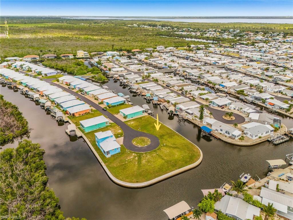Discover Treasure Cove, Pine Island’s newest waterfront community, with fast, deep-water access to San Carlos Bay and the Gulf of Mexico. Designed with boaters in mind, Treasure Cove offers an exceptional location for fishing, cruising, and enjoying the Southwest Florida waterfront lifestyle. YOU MUST CHECK OUT THE VIDEO FLYOVER IN THE VIRTUAL TOUR. The community features low HOA fees, central water and sewer, and new homes built to today’s elevation standards to help reduce flood risk. Choose a complete home-and-lot package or purchase your waterfront homesite separately and build when you’re ready—there is no required timeline to begin construction. All home plans are subject to HOA approval. Secure your place in this new Pine Island waterfront community and start planning the home—and boating lifestyle—you’ve been waiting for.