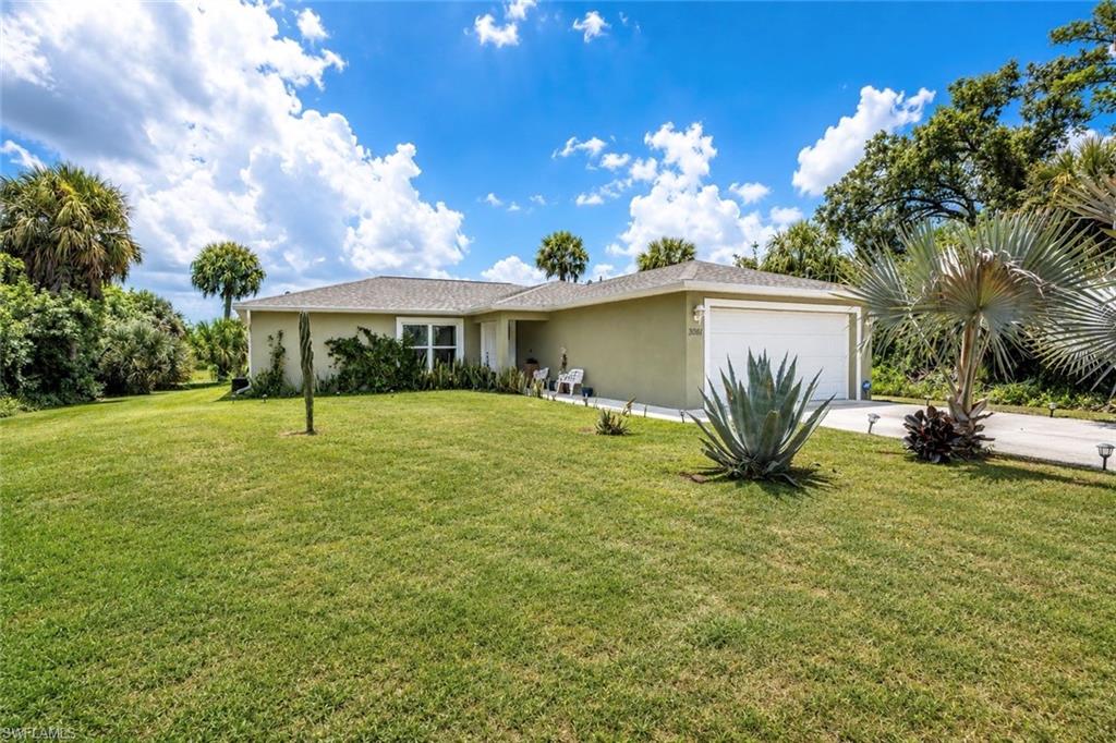 Welcome to 3061 NW Beechwood Cir. This exceptionally well maintained 3 bedroom, 2 bathroom home is tucked away in a safe and quiet neighborhood and sits on a spacious 1/4-acre lot with no adjacent neighbors. Adding even more privacy, the property backs up to a large protected greenbelt, ensuring no future building directly behind the home. Inside, the home features a spacious kitchen complete with a large center island, pantry, and an open living area with a dedicated dining space. Moving to the primary suite, the master bedroom offers large bedroom space and a nicely sized master bath with his and hers dual vanity sinks. Inside also features the utility room and two additional guest bedrooms and a full guest bathroom. Moving to the exterior, the open rear lanai is a great area to relax and enjoy the Florida weather with family and friends. For added value and efficiency, the home is also equipped with energy-efficient solar panels to help lower monthly electric bills while offering long-term utility savings. This home is beautiful inside and out, Schedule your private showing today.
