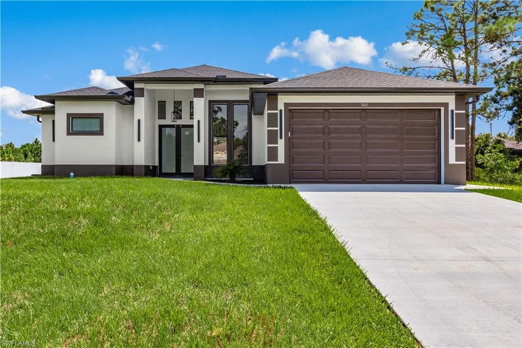 Welcome to this beautiful modern home featuring a spacious open floor plan, high ceilings, and stylish finishes throughout. The kitchen offers a large island, stainless steel appliances, and plenty of space for cooking and entertaining. The primary suite features a spacious bathroom with a beautiful walk-in shower and modern fixtures. Outside, you’ll find a covered patio and a large backyard, perfect for relaxing or spending time with friends and family. With its bright, open spaces and thoughtful design, this home is ready for you to move in and make it your own!