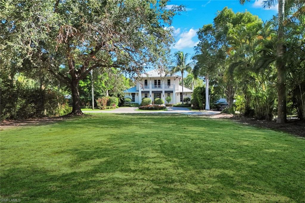 One or more photo(s) has been virtually staged, AI generated or rendered.   This prime lot (0.22 Acres) features a private ALLEY ACCESS, allowing for a discreet rear-entry garage—perfect for ADDITIONAL GARAGE BAYS, a collector’s showcase, golf cart storage, or space for watercraft and toys. This thoughtful feature enhances both privacy and architectural flexibility, ensuring your vision can flourish. This BUILD-READY homesite presents a rare chance to create a custom coastal retreat tailored to your vision. Positioned north of Central Avenue in one of Olde Naples most distinguished and highly sought-after residential settings. Surrounded by elegant estates and lush tropical landscapes, the property offers both prestige and limitless potential in an iconic Olde Naples locale. Just blocks from the vibrant pulse of Fifth Avenue South, this location offers effortless access to the city’s finest dining, designer boutiques, art galleries, and curated cultural experiences. Old Naples’ charm is unparalleled: a harmonious blend of high energy and relaxed coastal elegance. Beyond the downtown vibrancy, this homesite is just moments from Naples’ iconic white-sand beaches, where morning strolls, ocean breezes, and unparalleled sunsets await. Build your dream!  Live in the Naples lifestyle.  Embrace the extraordinary!  A Property video is attached to the listing to enhance your vision. Keep Living The Dream