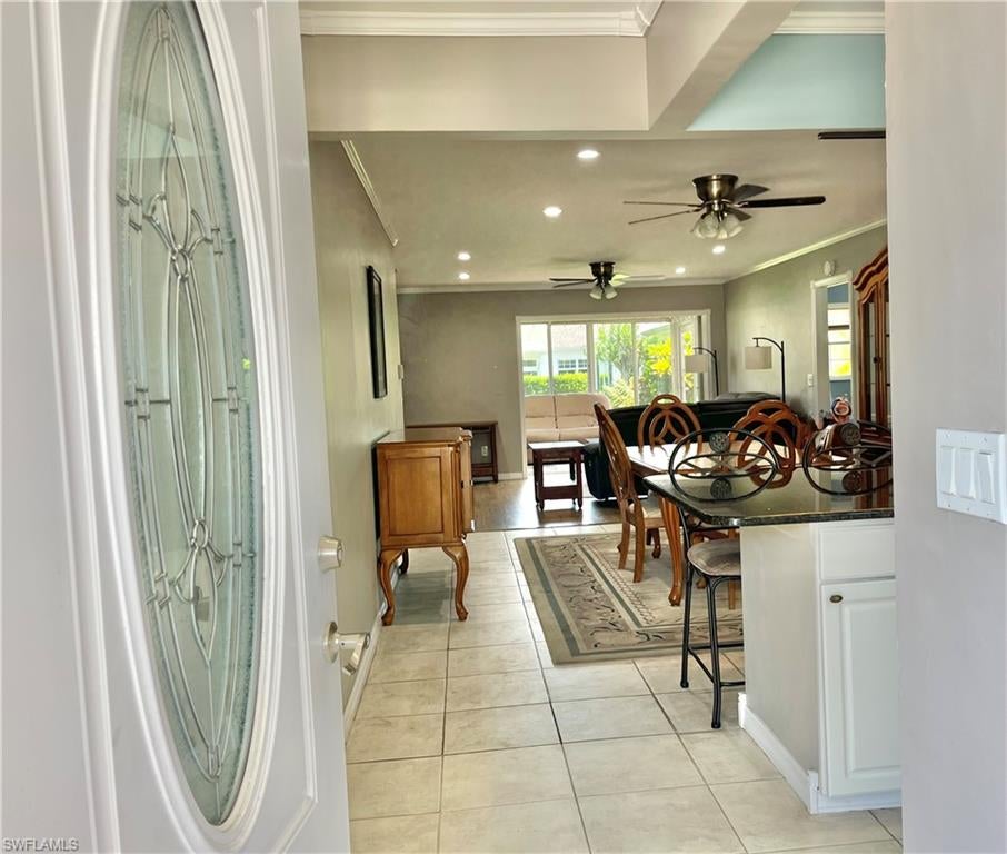 *NICELY FURNISHED* large 2 Bedroom 2 bath, plus den END UNIT AVAILABLE NOW! The end unit location adds a nice element of privacy within this 55+ community. 6925 Par Way is nicely updated with an open floor plan. The beautiful granite countertops include an oversized workspace which merges the kitchen with the dining and living rooms. The former lanai has been converted into an air conditioned family room. There is an ATTACHED SINGLE CAR GARAGE which also has A LAUNDRY CENTER. The Community offers many amenities. Some of which are a heated pool, a clubhouse with a kitchen and library, a pool table, and a social committee that hosts regular events. Myerlee is a wonderful walking community with a public executive golf course for you golfers! The location is conveniently located near restaurants, theaters, shopping, ball parks, and of course the beach. This great condo is ready for you to move-in!