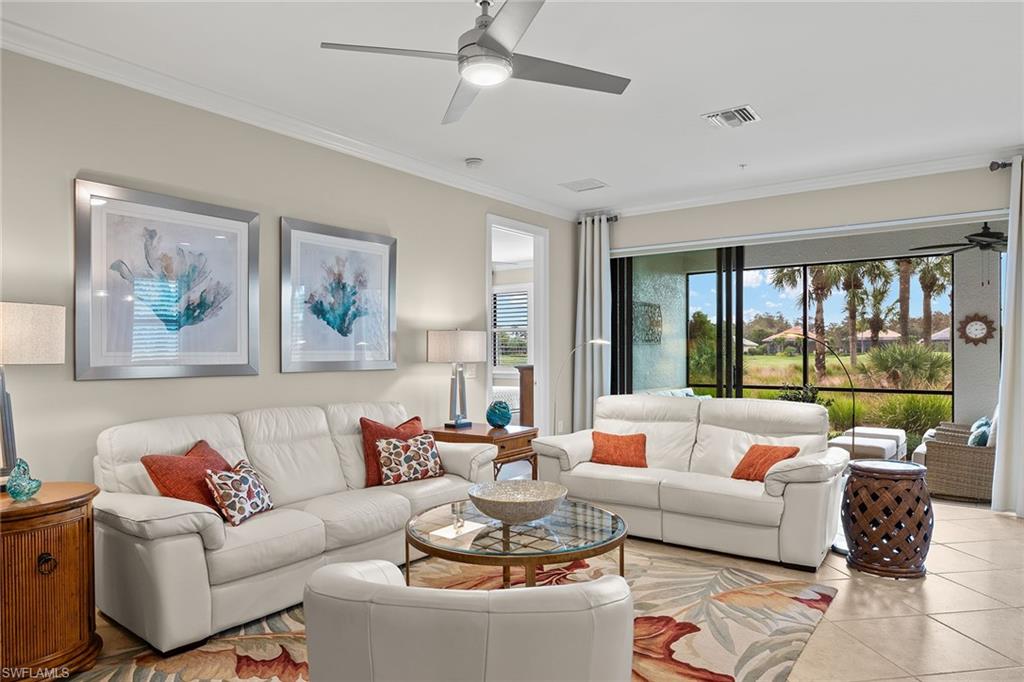Enjoy life with immediate golf and a designer turnkey condominium. Welcome to a contemporary retreat in the vibrant community of TwinEagles with two 18-hole courses. This spacious 1,654-square-foot home is designed with modern flair, offering an inviting and airy atmosphere. As you enter, you'll be greeted by a light-filled interior that highlights the open-concept design. The kitchen is a standout feature, boasting sleek white cabinetry, matching quartz countertops and high-end stainless steel appliances, making it a dream for everyday living and entertaining. The living space flows effortlessly to a screened-in lanai, where you can relax and take in the stunning views of the tranquil lake and lush golf course. This serene outdoor space is ideal for enjoying Florida's beautiful weather and hosting gatherings. This home combines modern elegance with a peaceful setting, providing a sanctuary in the heart of Naples. TwinEagles is one of the finest communities in Southwest Florida, experience 1,115 acres of natural tranquility, two championship golf courses, Talon course designed by the Nicklaus Group and The Eagle Course designed by Steve Smyers. New clubhouse, bocce courts, Himalayan putting green, fitness center, tennis, pickleball, resort pool and tiki bar. Embrace the Naples lifestyle in this stunning lakefront home, where every detail has been carefully curated to offer an unparalleled living experience. Bonus, new roof in 2022 and new air conditioner.