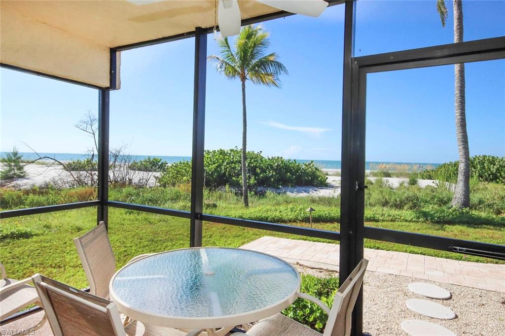 Life is better at the beach and this condo features all the best of beach life!  Decorated with tranquil ocean colors, designer coastal cottage furniture, exquisite sea glass light fixtures and a custom sea scape mural over the stove, you will feel like you have truly stepped foot in paradise.  First floor corner location next to a natural preserve allows additional privacy to enjoy your vacation while still only being steps away from the beach. Direct Gulf views from the screened lanai and master bedroom will enhance your vacation experience allowing you to enjoy the full beauty of Sanibel’s world renown beaches from the comfort of your own island retreat.  Recent improvements include raised ceilings, Bosch appliances, custom kitchen cabinets with pull out shelves, porcelain tile throughout, upgraded heavy pocket doors, guest bath with tub and shower combo, plantation shutters and large screen tv’s in each room.  If you are looking for an investment property, look no further!  Future bookings are strong and will continue to provide excellent rental income for a new owner.  Come see this island gem before it is gone and make your island dreams come true!