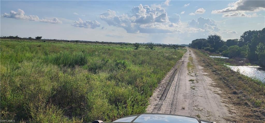 *9.68 ACRES IN LABELLE* NO HOA! *HORSES WELCOME* Discover your slice of country paradise! This 9.68 acre lot in desirable LaBelle offers TOTAL FREEDOM-No HOA , No Deed Restrictions! Perfect for your dream home, ranch,
farm, horses, cattle or investment. Zoned Agriculture, bring your RV, Trucks and animals! Quiet rural setting with country road access. Just minutes to SR-80, downtown LaBelle, Walmart and easy commute to Fort Myers, Lehigh Acres & Clewiston. Large parcel like this are disappearing fast!