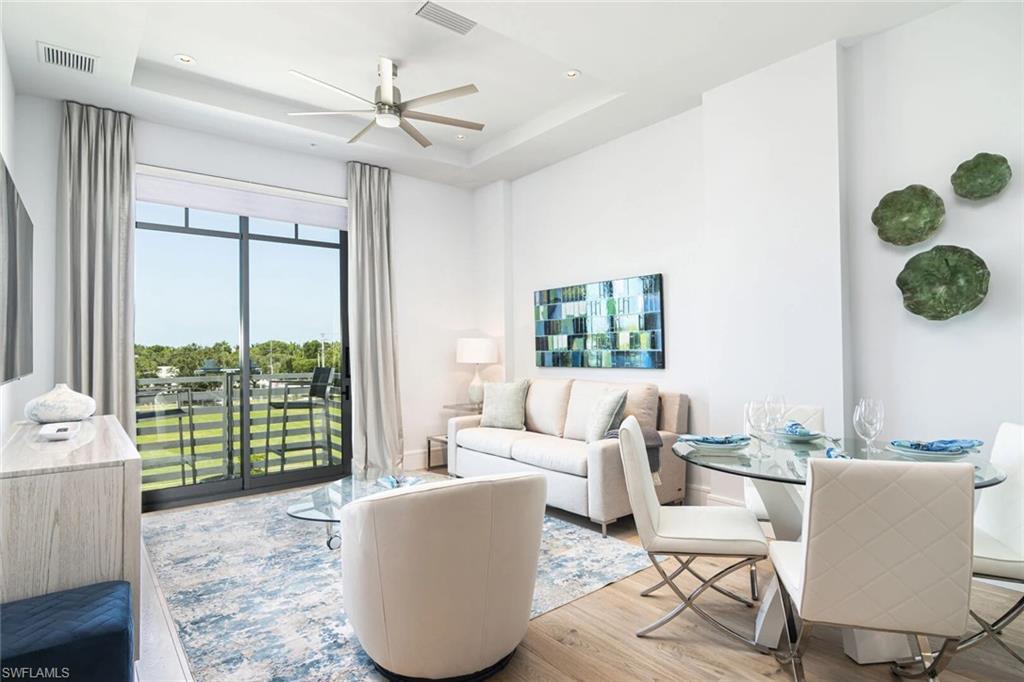 Unit 308 is a 1-bedroom, 1-bath top floor luxury condo with a desirable west-facing balcony! The bedroom has a king-size bed and the living room is equipped with a sleeper sofa to accommodate a total of four guests. SoCe Flats is an exciting new condominium development in the most desirable neighborhood in Naples, the Paradise Coast?s most coveted beach town. "SoCe", named for the ideal location South of Central Avenue in Olde Naples, offers the unique opportunity for a luxurious short-term vacation stay, walking distance to the beach and elegant 5th Ave S shopping and dining district. The building was designed by renowned local architect, MHK, and the interiors are decked out with finishes and furnishings selected by coastal contemporary design experts, Clive Daniel Home. UNIT Unit 308 has an open kitchen with sleek gray quartz countertops and a three seat breakfast bar. The fully equipped kitchen has cookware, dishes, utensils and serve ware and there is a four seat dining table in case you ever decide to forego the fantastic restaurants within walking distance and eat in! The bedroom has a king size bed made up with crisp white linens and the living room has a sleeper sofa to accommodate a total of four guests. Sliding glass doors with western exposure lead out to the balcony, equipped with a two-top table - perfect for sipping morning coffee or a cocktail while the sun goes down on the horizon! The bathroom is accessible from the living areas and has a full size front load washer and dryer for laundry convenience. There is one assigned covered parking space on the ground floor and additional public parking is available along 8th St S. Note, since this building is zoned for short term rental only, it does not receive USPS mail service and you will not have access to a mailbox during your stay. Designed to offer urban sophistication and amenities within a quaint beach town setting, SoCe Flats is an ideal place to enjoy the increasingly cosmopolitan Naples lifestyle! Onsite, the 18-unit building has a private open air amenity deck on the third floor with an outdoor grilling area, lounge and dining seating and a TV. SoCe is located along the growing "8th Street Corridor" in Olde Naples just three short blocks from 5th Ave S and eight blocks from beach access at the end of charming 1st Ave S. Many other conveniences are within walking distance such as Wynn's gourmet market and CVS.