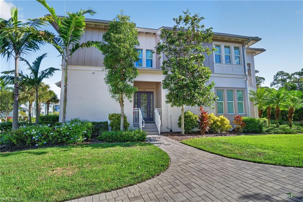 One or more photo(s) has been virtually staged, AI generated or rendered.  The VERY UPSCALE ISLES OF COLLIER PRESERVE, STUNNING BUILDER/OWNER ($100,000+/-) UPGRADES in this 3 BEDROOM, 2 BATH, 2 CAR GARAGE HOME. Offering 1,621+/- living sq. ft. of "SINGLE LEVEL" living. Home has: OPEN FLOOR PLAN, 10' CEILINGS, CROWN MOLDING, CERAMIC TILE FLOORS (Ease of maintenance), AND CARPET, ALL WINDOWS ARE "HURRICANE RESISTANT" for total storm security and all windows are DESIGNER WOOD "PLANTATION SHUTTER" accented. "CHEFS" KITCHEN with WOOD "SHAKER" CABINETS, LEVEL 5 QUARTZ COUNTER TOPS, ALL STAINLESS STEEL HIGH END APPLIANCES AND ISLAND STATION FOR PREP AND FAMILY GATHERING. Master Bedroom, has volume ceilings, HIS & HERS WALK-IN CLOSETS, DUAL GRANITE SINKS AND VANITIES, SOAKING TUB AND FLOOR-TO-CEILING GLASS & TILE WALK-IN SHOWER. This OVER-SIZED garage is a dedicated CAR enthusiast's space, featuring a durable epoxy floor and includes NEWER HIGH END (COST $12,000) GOLF CART FOR BUZZING AROUND THE COMMUNITY & IT STAYS WITH THE HOME. It strategically allows for ample car storage including the golf cart while providing effortless, zero-step access. The spacious SCREENED lanai is perfect for entertaining, accommodating dining for 6-8 guests while offering privacy and serene preserve views where abundant wildlife is your closest neighbor. RESIDENTS ENJOY WORLD-CLASS AMENITIES WITH A LOW HOA fee. The Isles Club’s amenities include: COMMUNITY CLUB HOUSE, RESORT STYLE POOL & ADDITIONAL LAP POOLS, HEALTH & WELLNESS CENTER, 14 PICKLEBALL COURTS, TENNIS CENTER AND THE ON-SITE "OVERLOOK" BAR AND GRILL, for casual poolside entertaining. Just minutes to downtown OLDE NAPLES, 5TH AVE & 3RD STREET SOUTH, for all the best of Naples RESTAURANTS, BARS, LOUNGES AND ENTERTAINMENT. HOME COMES WITH ONE YEAR COMPLETE "HOME WARRANTY" FOR TOTAL BUYER COMFORT! This is a PREMIER GROUP, BEST VALUE COLLIER PROPERTY VALUE!