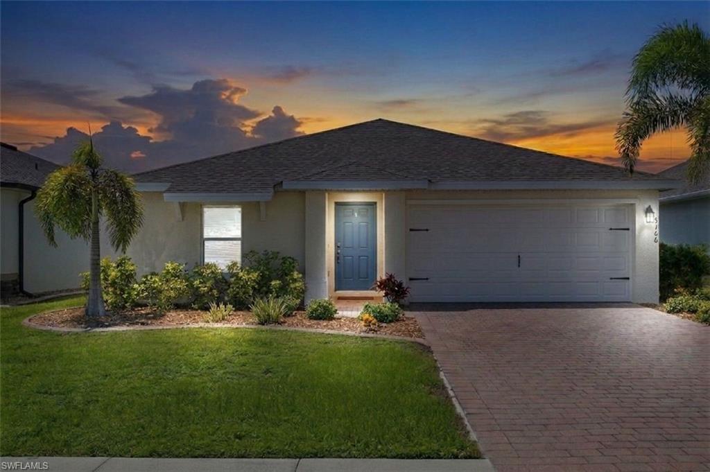 Price Reduction!  An amazing opportunity to live in highly sought-after Cape Coral Village at Entrada! This single-family home boasts 4 bedrooms, 2 bathrooms, and a spacious 2-car garage. The open floor plan is perfect for entertaining, with a modern kitchen featuring stainless steel appliances, solid counter tops and a breakfast bar. The home is beautifully appointed with a mix of carpet and tile flooring throughout. Step outside to enjoy the resort style community pool, bocce ball courts, pickleball courts, and tennis court - all within the Village at Entrada community. Stay active and fit in the on-site fitness center or simply relax and soak up the Florida sunshine in your own backyard oasis on the preserve. With low HOA fees and no CDD fees, this home offers the perfect blend of luxury and affordability. Don't miss out on this incredible opportunity to own a piece of paradise in Cape Coral Village at Entrada. Live the Florida lifestyle you've always dreamed of in this beautiful home - schedule your showing today!