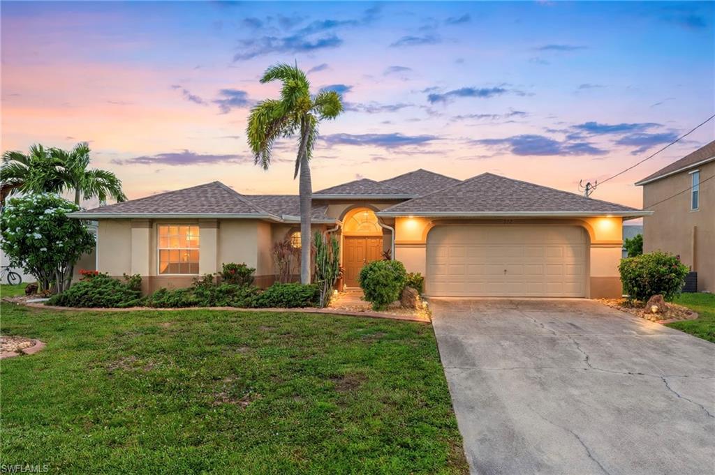 BUYERS' AGENTS WELCOME!  Beautiful 3 bedroom PLUS den courtyard POOL home with HIGH ceilings, open floor plan in highly desirable SW Cape Coral with NO HOA. Located in X Zone and flood insurance is currently not required. Lots of natural light with an abundance of windows and sliders. Large TILE FLOOR THROUGHOUT (NO carpeting ANYwhere), slab granite countertops in kitchen (plus full slab backsplashes) and bath rooms (except for Casita bath), and Kitchen Aide stainless appliances.    Oversized master bedroom with large walk-in closet and spa-like bathroom with separate soaking tub.  Both the master bedroom AND the master bath open directly onto pool area.  Imagine! There are actually 6(!) doors that open directly onto pool area creating beautiful vacation-like vistas throughout the home.  Another slider opens to back yard area. Separate casita bedroom (that also has sliders opening onto pool area) and bath is perfect for in-laws or guests. Newer roof, hot water heater, and HVAC.  Close to schools, shopping, Sunsplash waterpark and Pine Island Road Corridor. To top it off...HUGE oversized garage that has perfect area for a workshop! Could use some touch up paint inside and some additional landscaping, but otherwise in pristine shape! City sewer and water and assessments have been paid in full.
