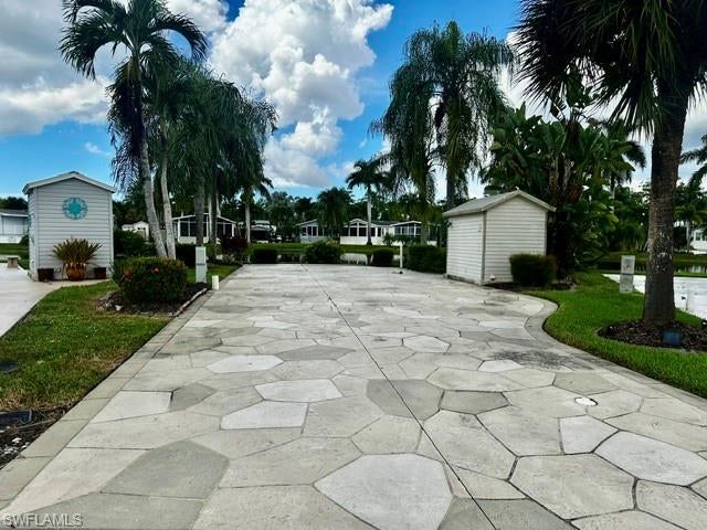 Beautiful Oversized Lakefront RV Site with Spectacular Water Views!

Location, location, location! Enjoy the Florida lifestyle from this desirable larger lakefront RV site, perfectly situated on a cul-de-sac point overlooking Silver Lakes' beautiful second lake.

This attractive painted and sculptured concrete site features dual hookups, providing added convenience and flexibility for your RV. The property also includes a 6' x 10' storage shed and lovely landscaping that enhances the tropical setting.

The spacious lot and exceptional location offer beautiful lake views and a wonderful setting for relaxing outdoors, entertaining friends, or simply enjoying the Southwest Florida sunshine.

Located within the gated Silver Lakes RV & Golf Resort in Naples, Florida, residents enjoy resort-style amenities including a 9-hole golf course, three swimming pools, two hot tubs, two clubhouses, pickleball, tennis, fitness center, and a variety of planned activities and social events.

Don't miss this fantastic opportunity to own a spacious lakefront property in one of Naples' desirable RV resort communities!