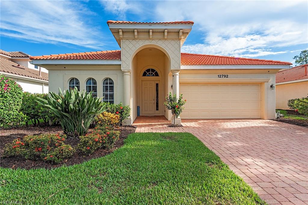 Welcome to your dream Florida lifestyle! This beautifully furnished three-bedroom, two-bath pool home offers tranquil lake views and effortless elegance in the sought-after Aviano neighborhood. Featuring an open great room floor plan with tray ceilings, the space is ideal for relaxed living and stylish entertaining. The kitchen is a chef's delight, complete with granite countertops, stainless steel appliances and a spacious pantry all overlooking a bright breakfast nook. The generous primary suite includes a cozy sitting area, custom walk-in closet with built-in cabinetry, and a spa-like bath with dual vanities, a soaking tub, and a separate shower. Go outside to your private covered lanai, ideal for alfresco dining and poolside relaxation with serene lake views. Just a short distance away, enjoy the community's resort-style amenities including a pool and spa, a state-of-the-art fitness center and social room. Just minutes from downtown Naples, world-class dining and sugar sand beaches.